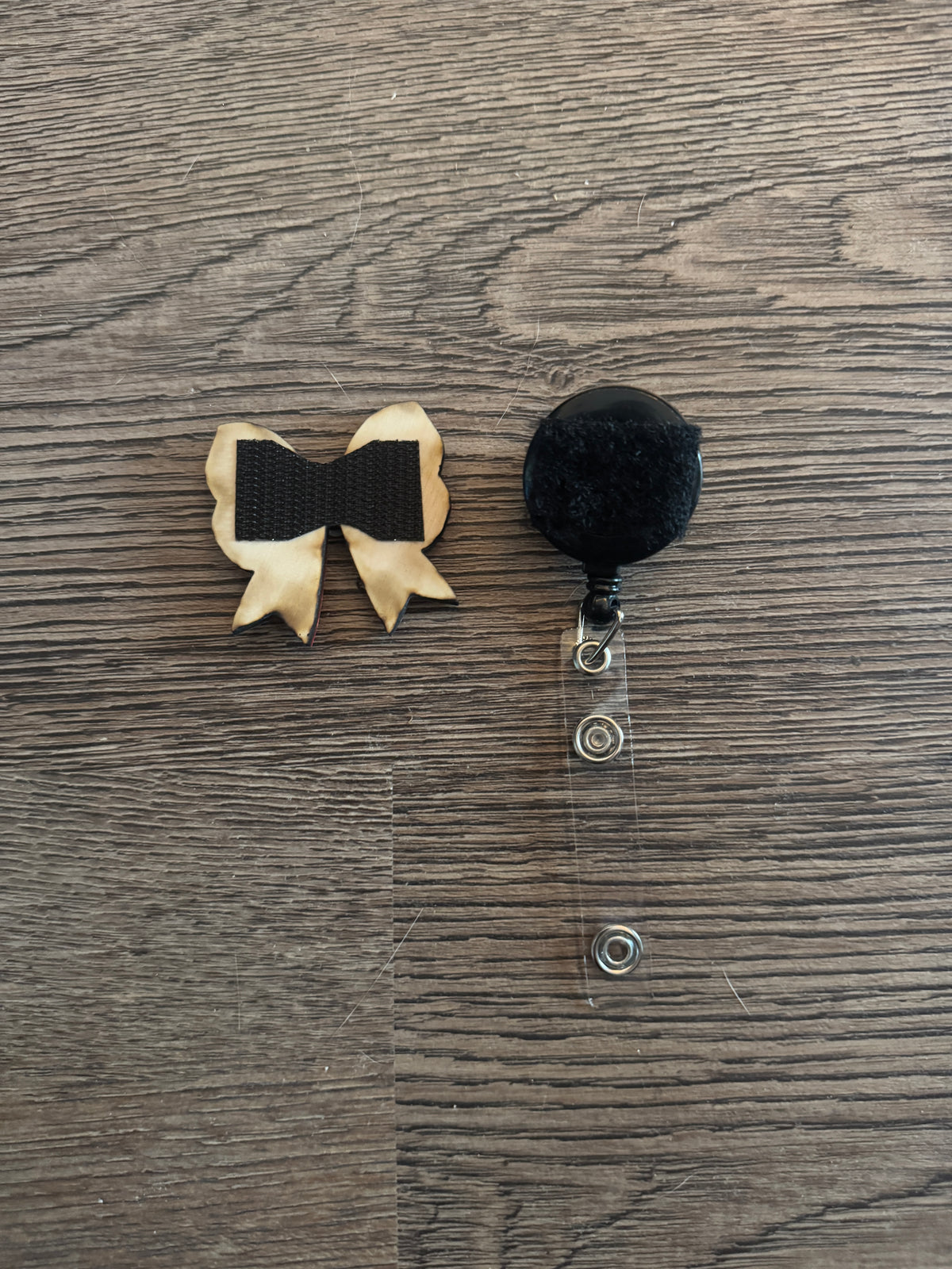 Reel for interchangeable velcro badges