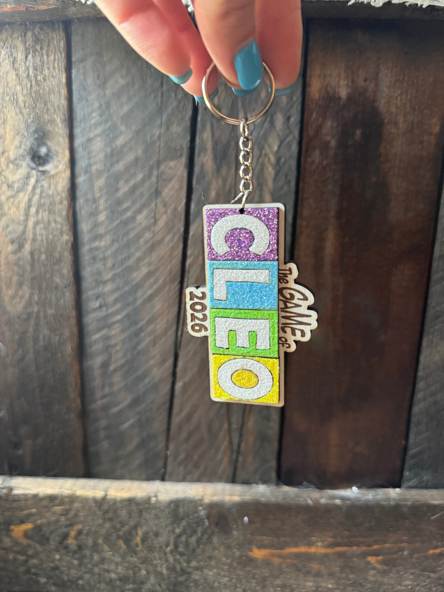 Game of Cleo Glittery Keychain/Magnet