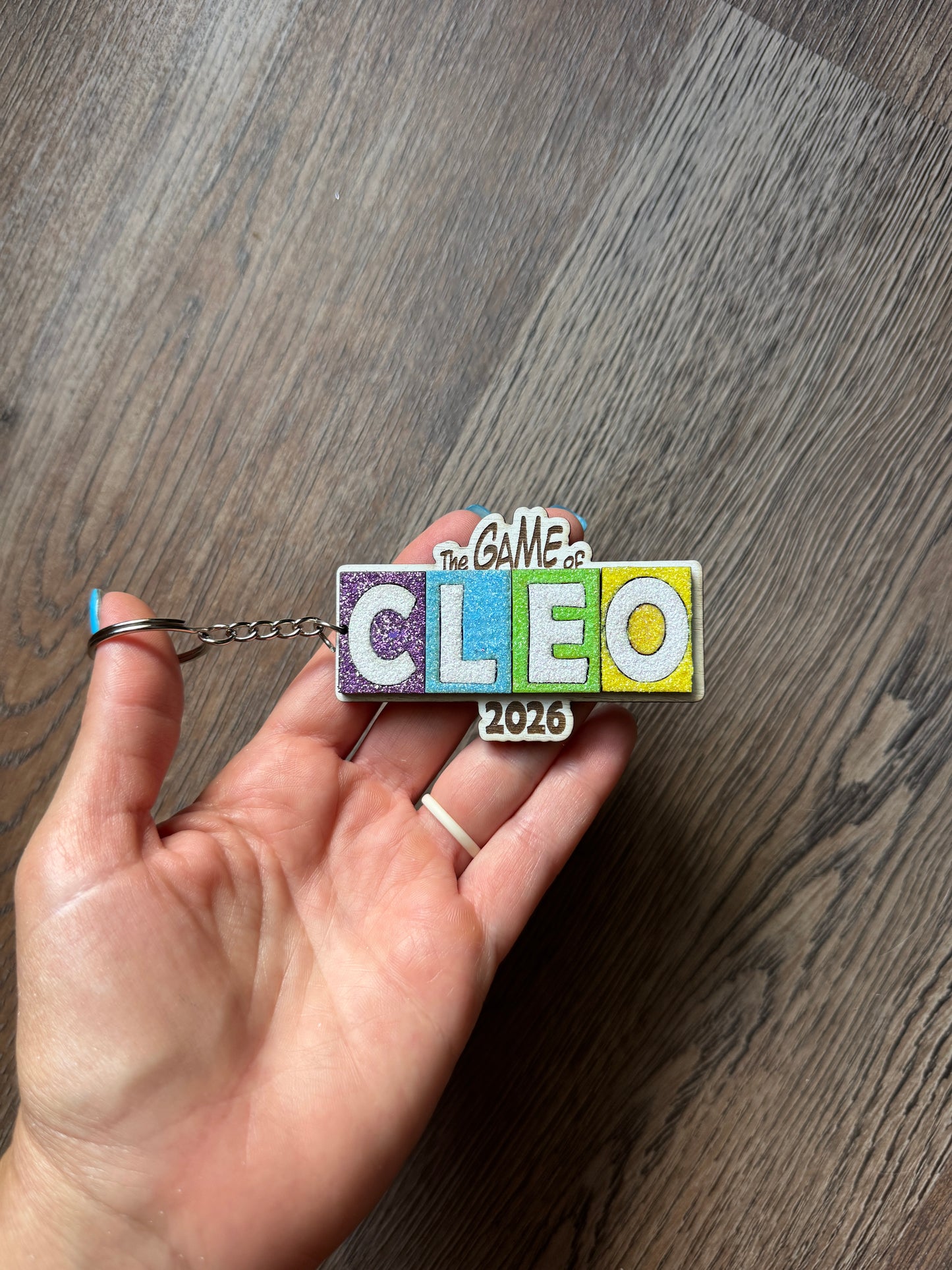 Game of Cleo Glittery Keychain/Magnet