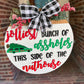 Christmas Jolly Assholes Door Hanger