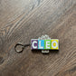 Game of Cleo Glittery Keychain/Magnet
